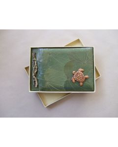 leaf albums with animal carvings