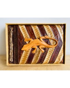 seed pod albums with  animal carvings
