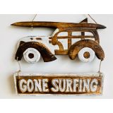 Wooden whitewash car with surfboard sign